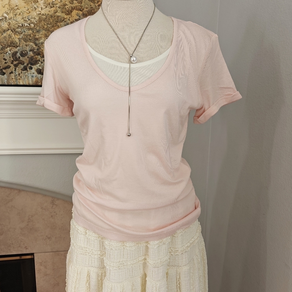 New with tag — light pink layered-look top.